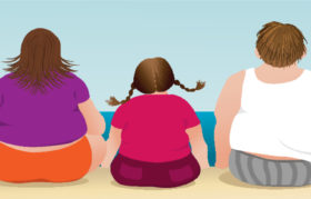Übergewichtige Familie am Strand